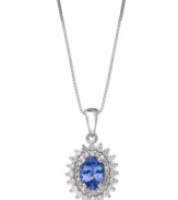 Take your look up a notch with a stunning burst of sparkle. This 14k white gold pendant showcases oval-cut tanzanite (3/4 ct. t.w.) encircled by two rows of round-cut diamond accents. Approximate length: 18 inches. Approximate drop: 1/2 inch.