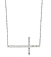 A stunning testament. This necklace features a sideways cross with cubic zirconia accents adding a lustrous touch. Crafted from sterling silver. Approximate length: 18 inches. Approximate drop length: 3/4 inch. Approximate drop width: 1-3/8 inches.