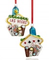 A safe bet. The Las Vegas ornament adds a sense of fun to the holiday season with casino essentials in colorful glass.