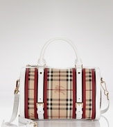 Signature logo print coated canvas gets a color block treatment with the addition of red, black and white leather accents. Convertible straps add the option of carrying in the hands or resting on the shoulder. From Burberry.