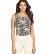 Calvin Klein's animal-printed top will add a stylish pop to your ensemble when it peeks out from your blazer.