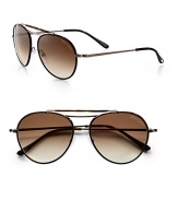 Classic metal aviators feature signature Tom Ford T temples and logo engraved lens. Available in nickel with gradient brown lens.Signature Tom Ford T temples100% UV protectionMade in Italy