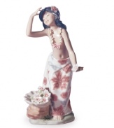 Have a luau in your living room with Lladro's beautiful hula dancer. Wearing a traditional flower lei and Hawaiian-style skirt, this handcrafted figurine evokes all the allure of the Aloha state.