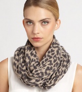 An endless design crafted of luxurious cashmere with a fierce animal print. Cashmere12 X 26½ loopDry cleanImported