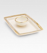 A beautiful design inspired by the pageantry of ancient horseraces features a handcrafted porcelain tray and matching bowl, both carefully glazed in concentric circles of 24k gold, platinum and rose gold. Ideal for hummus, salsa or any favorite dip Dishwasher safe 4¾W X 1½H X 4¾D Made in USA 