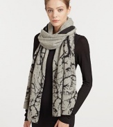 An ultra-soft, ultra-luxe cashmere design is adorned with a large tree print.Cashmere24 X 74Dry cleanImported