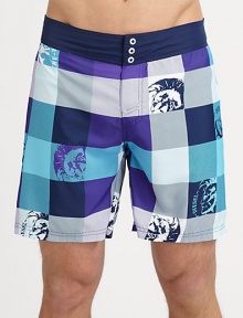 Bold, colorful plaid swim trunks with graphic detail in quick-drying nylon.Elastic waistBack flap pocketInseam, about 7PolyesterMachine washImported