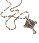 A cross with a little extra flair. This pendant by the Simmons Jewelry Co. features a stainless steel cross with a raised wing and skull design. Approximate length: 22 inches. Approximate drop: 2-1/4 inches.