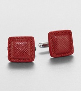 Distinctive cuff links crafted of textured leather. About 0.6 squareMade in Italy