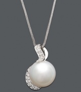 You will be absolutely enamored with the timeless elegance of a simple pearl. A cultured South Sea pearl (13-14 mm) suspended from a 14k white gold setting and chain is highlighted by sparkling round-cut diamonds (1/3 ct. t.w.). Approximate length: 18 inches. Approximate drop: 1 inch.