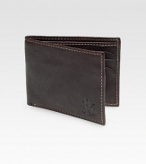 A slim-fold design travels discreetly in your pockets, while keeping your cash and cards neatly organized, cut from pebbled vegetable leather with contrast stitching and a digital printed lining for signature appeal.One billfold compartmentSix card slotsCotton twill/leather liningLeather4W x 3HImported