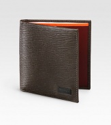 Slim design crafted in Italy from pebbled Italian leather, highlights a side profile with a bold, contrasting interior and plenty of slots to keep your cards neatly secured.One billfold compartmentEight card slotsLeather4W x 3HMade in Italy