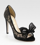 Intricately crafted, semi-sheer lace silhouette with a skinny heel, peep toe and divine bow adornment. Self-covered heel, 4 (100mm)Semi-sheer lace upperLeather lining and solePadded insoleMade in Italy