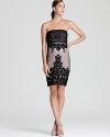 Sue Wong gives off an air of mystery with this alluring strapless dress, adorned with dark lace and beaded details.