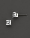 Traditional four prong princess diamond stud earring in a white gold setting.