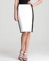 The pencil silhouette gets a modern update with this 10 Crosby Derek Lam skirt. The black and white color-blocking is an unexpected touch that is sure to give your go-to work wardrobe a little boost.