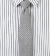 Slightly textured pindot tie adds finishing touches to any modern dress wardrobe.57% cotton/43% silkDry cleanMade in USA