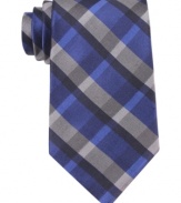 Need a simple solution for your wardrobe of solids? Suit up with this plaid tie from Calvin Klein.