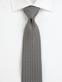 A distinguished silk tie with an irresistible print.SilkDry cleanMade in Italy