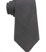 A micro-pattern and skinny construction make this DKNY tie the perfect addition to your modern mix.