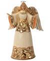 Full of great joy, this angel welcomes the Christmas spirit into your home. While striking gold and cream hues dance across her robe & wings, her calm expression & peaceful countenance create an undeniable warmth.