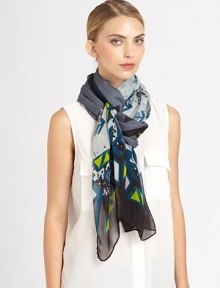 A hand-printed, colorful abstract print adorns a woven scarf.Viscose40 X 74Hand washImported