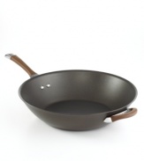 A deep, rich chocolate tone, with a superior nonstick finish and bowl-shaped high sides that keep contents in the pan and not on the floor, turns things up in the kitchen, making every meal a mixture of sophistication and ease. Constructed for professional performance with a hard-anodized construction, impact-bonded stainless steel base and dishwasher-safe finish. Lifetime warranty.