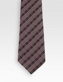 A sartorial standard woven in Italian silk.About 2.8 wideSilkDry cleanMade in Italy