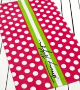 Pretty in pink. A white and hot pink polka dot pattern give this Tommy Hilfiger beach towel a perfectly preppy flair. Finished with a chic lime green and white stripe and the Tommy Hilfiger signature.