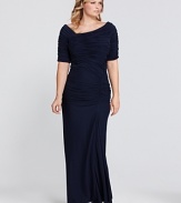 Stop a room in this classically elegant gown from Tadashi Shoji Plus. Unique ruching on the bodice lend a flattering finish.