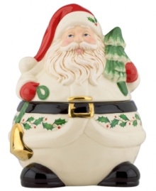 Just begging for baked goods, Santa's round little belly serves as the perfect cookie jar. With festive gold accents and a holly motif to match the beloved Lenox Holiday dinnerware collection.