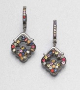 A rainbow of richly hued sapphires in an open quatrefoil-shaped design hangs from a stone-set hoop.SapphiresBlack rhodium-plated sterling silverLength, about 1PiercedImported