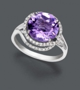 Make a clear statement with bold color. This Effy Collection ring features a stunning round-cut amethyst (4-1/4 ct. t.w.) surrounded by swirls of sparkling diamond (1/4 ct. t.w.). Crafted in 14k white gold.