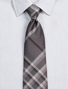 Smart checks in a sophisticated palette on pure Italian silk.About 3 wideSilkDry cleanMade in Italy