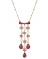 Go glam with Betsey Johnson. Teardrop and bow shapes adorn this multi-chain Y necklace. Featuring fuchsia-colored crystals, glass pearls and pink-colored crystals. Crafted in antiqued gold tone mixed metal. Approximate length: 16 inches + 3-inch extender. Approximate drop: 3 inches.