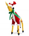 Animals all over the world embrace the season too, like this festively dressed giraffe boasting the soft, flexible features and unmistakable style of Annalee figurines.