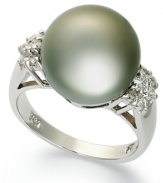 Perfectly elegant. A single Tahitian pearl (12-13 mm) stands out against an array of round-cut diamonds (1/4 ct. t.w.). Ring crafted in 14k white gold.