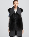 Luxe fur adorns this plush wool Vera Wang vest with oversized collar.