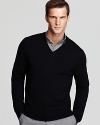 Sharpen your presentation with a handsome V-neck in premium merino wool, a luxe addition to your sweater drawer.