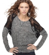 Open-stitch knit insets at the shoulder add eye-catching appeal to this otherwise simple Free People knit top!