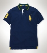 Accented with Ralph Lauren's Big Pony for iconic style, a trim-fitting tennis polo is crafted from breathable cotton mesh for superior comfort and performance.