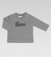 Crafted in plush cotton jersey with cursive Gucci print and shoulder buttons.CrewneckLong sleevesShoulder buttonsCottonDry cleanMade in Italy Please note: Number of buttons may vary depending on size ordered. 