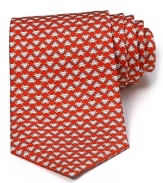 This whimsical Salvatore Ferragamo tie in rich silk will put an extra hop in your step from morning to night.