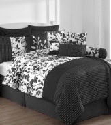 Black, white and chic all over! The Audrey comforter set boasts a silhouette leaf print with embroidered dots for an undeniably stylish look with a fresh, modern allure. This expansive set includes a reversible coverlet for lightweight warmth as well as five coordinating decorative pillows. (Clearance)