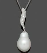 Like a shimmering piece of artwork, Belle de Mer's Baroque-style pendant will captivate. Crafted in 14k white gold, pendant highlights a cultured freshwater pearl (11-12 mm) and a stylish, swirling bail dusted with diamond accents. Approximate length: 18 inches. Approximate drop: 1-1/4 inches.