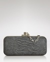 Elicit oh-la-las when your opt for this Rachel Zoe minaudière clutch. The python-embossed beauty shows off with shimmering silver-tone accents, loving sleek LBDs and floor-sweeping gowns.