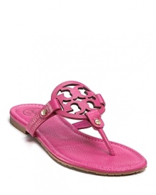 Bright, tropical pink thongs, finished with a bold Tory Burch Logo, remind us of lazy beach vacations.