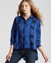 Boasting an eclectic print, this airy Amanda Uprichard shirt of rich silk takes on the high/low trend and masters it.