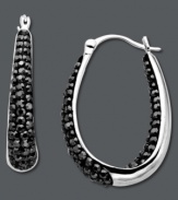 Brilliant shine from the inside out! Kaleidoscope stunning hoop earrings feature round-cut black crystals along the inside and outside. Crafted in sterling silver with Swarovski elements. Approximate diameter: 2-1/5 inches.