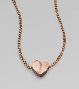 This simply chic piece features a tiny heart pendant. Rose goldtone plated brassLength, about 15¾Pendant size, about ¼Spring ring closureImported 